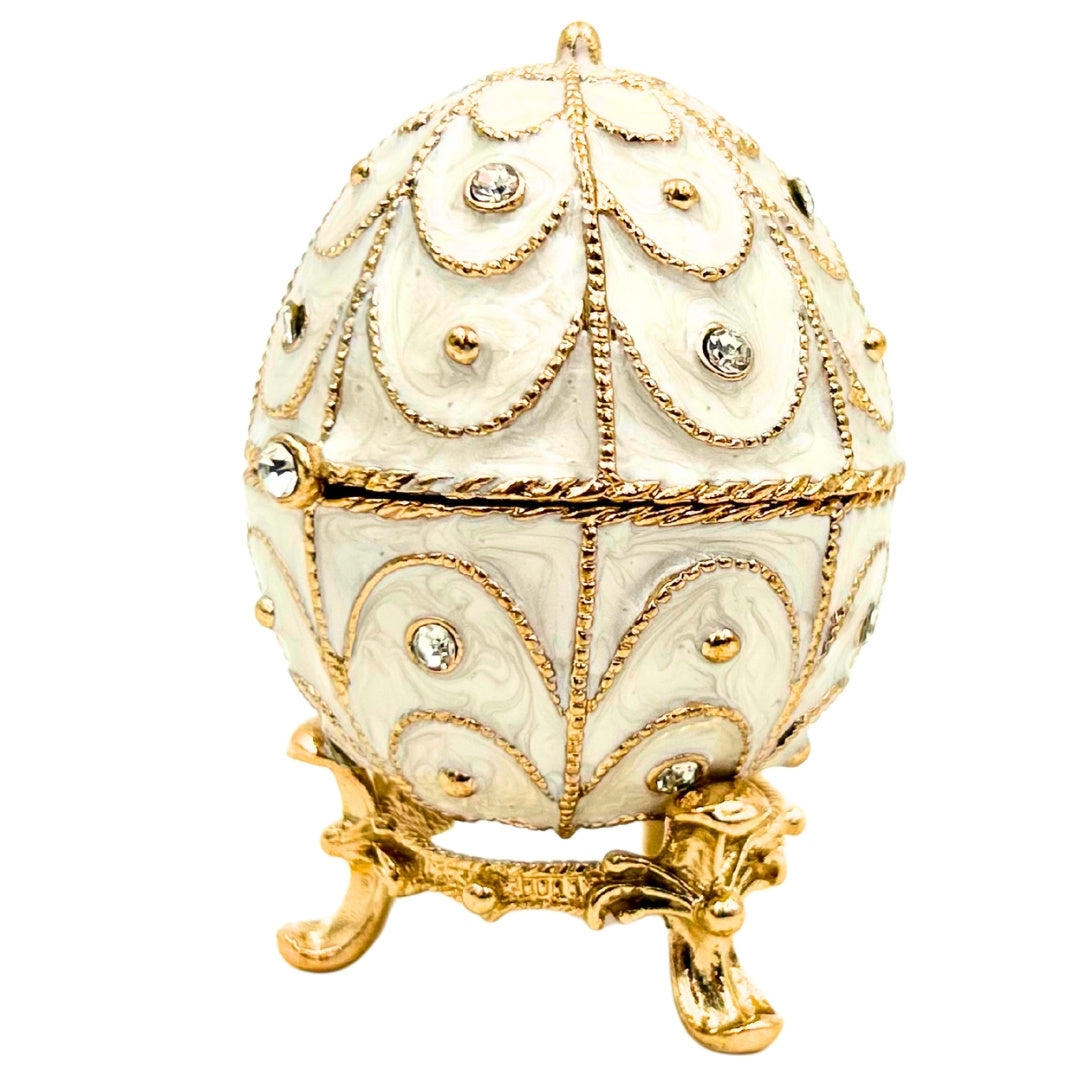 Exclusiva caja joyero huevo Fabergé metálico con cristales en color blanco y dorado con posibilidad de personalización con grabado
