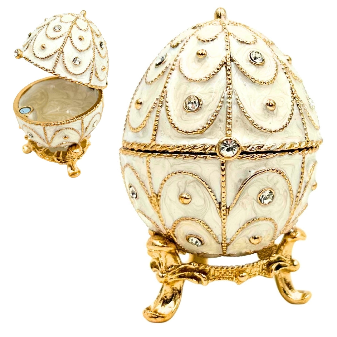 Exclusiva caja joyero huevo Fabergé metálico con cristales en color blanco y dorado con posibilidad de personalización con grabado