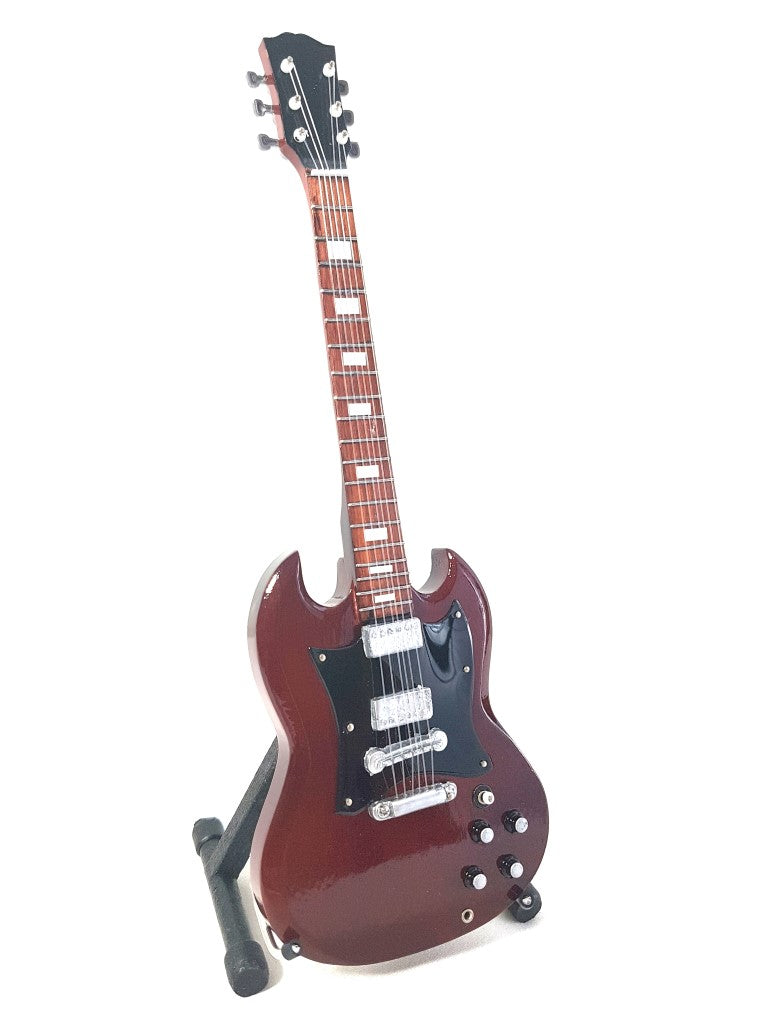 Mini guitarra AC/DC Angus Young MGT-0567 con posibilidad de grabado personalizado, ideal para regalo, hecha a mano en madera de caoba, color marrón, altura 27,5 cm