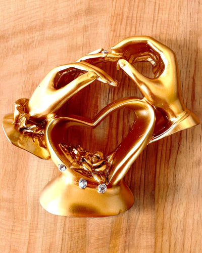 Figura "Toque de Amor" de 10 cm de altura, con opción de grabado para regalo