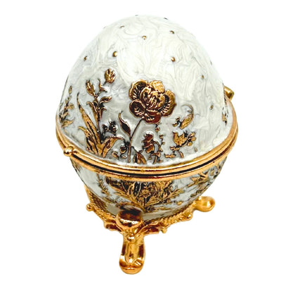 Exclusiva caja joyero huevo Fabergé metálico con cristales en color blanco y dorado con posibilidad de personalización con grabado
