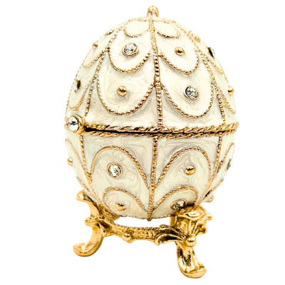 Exclusiva caja joyero huevo Fabergé metálico con cristales en color blanco y dorado con posibilidad de personalización con grabado