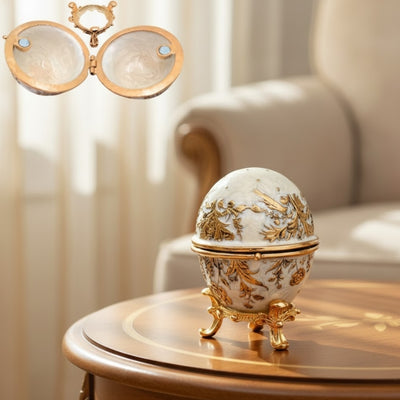 Exclusiva caja joyero huevo Fabergé metálico con cristales en color blanco y dorado con posibilidad de personalización con grabado