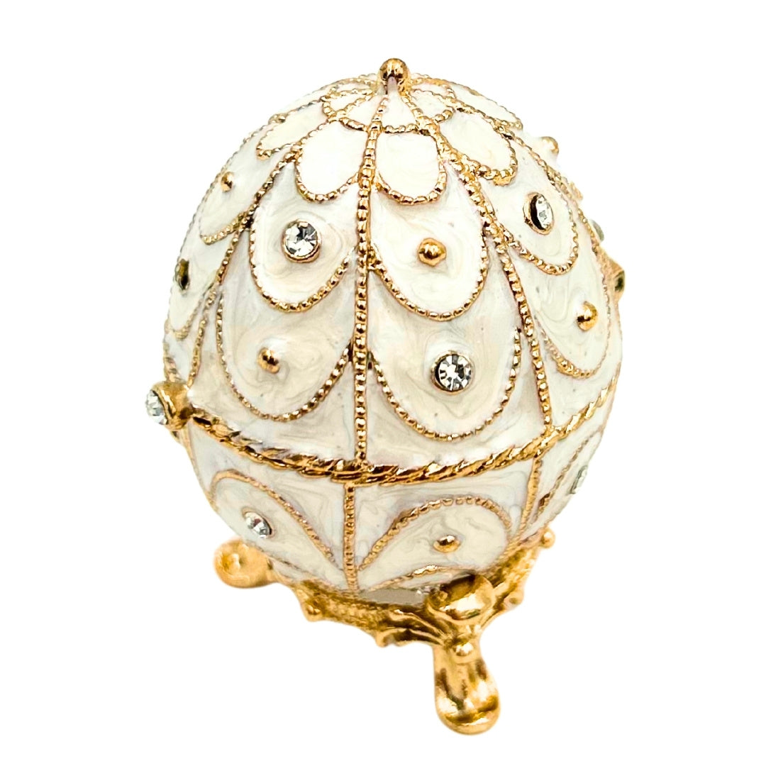 Exclusiva caja joyero huevo Fabergé metálico con cristales en color blanco y dorado con posibilidad de personalización con grabado