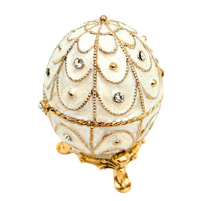 Exclusiva caja joyero huevo Fabergé metálico con cristales en color blanco y dorado con posibilidad de personalización con grabado