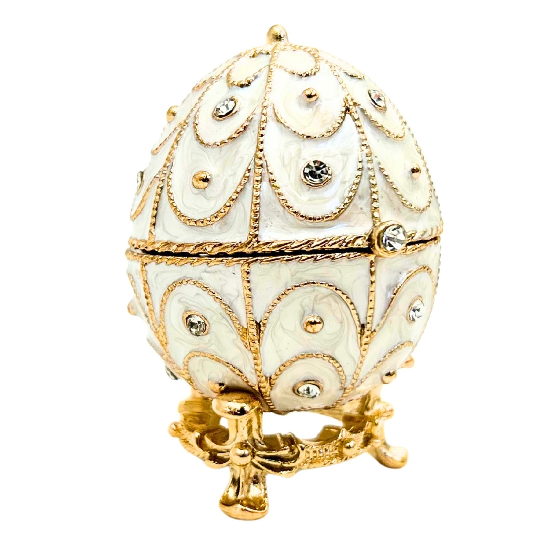 Exclusiva caja joyero huevo Fabergé metálico con cristales en color blanco y dorado con posibilidad de personalización con grabado