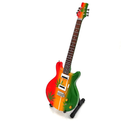 Mini guitarra Bob Marley Tribute Ganja MGT-0468 con posibilidad de grabado personalizado, regalo ideal para fans del reggae, hecha a mano en madera de caoba, altura 27,5 cm, colores amarillo, rojo, verde, blanco  
