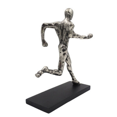 Estatuilla metálica de corredor con grabado
