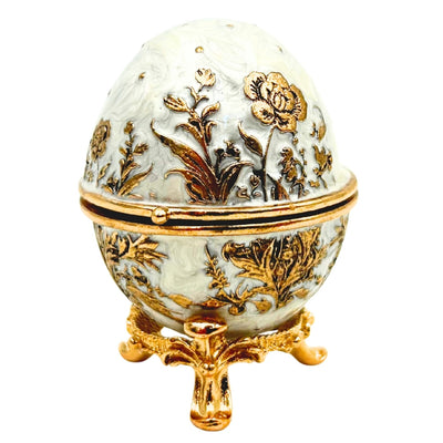 Exclusiva caja joyero huevo Fabergé metálico con cristales en color blanco y dorado con posibilidad de personalización con grabado