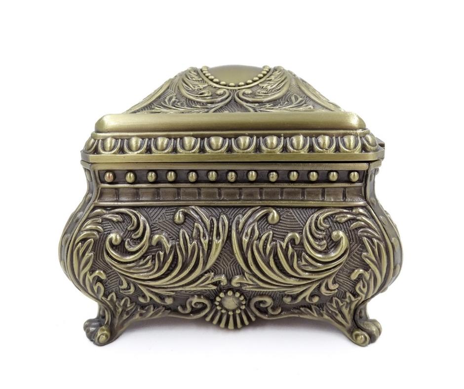 Elegante caja metálica decorativa con grabado
