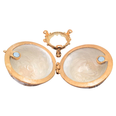 Exclusiva caja joyero huevo Fabergé metálico con cristales en color blanco y dorado con posibilidad de personalización con grabado