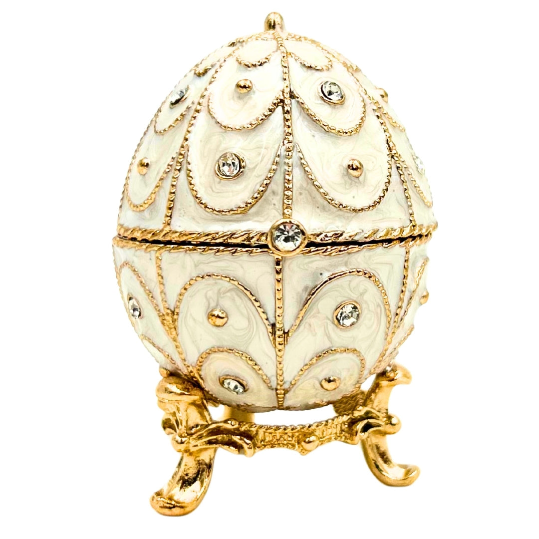 Exclusiva caja joyero huevo Fabergé metálico con cristales en color blanco y dorado con posibilidad de personalización con grabado