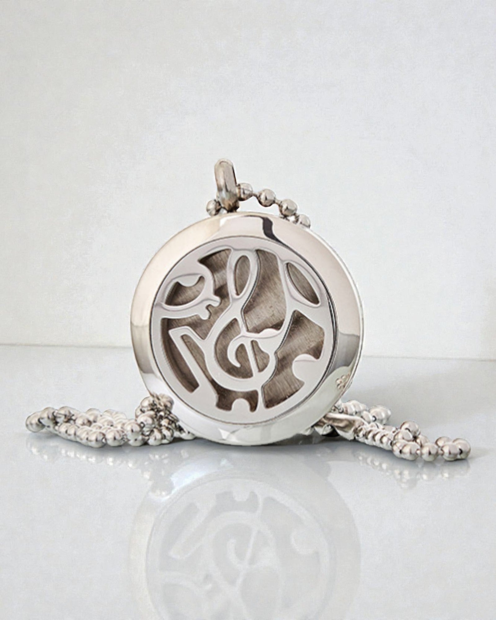 Sinfonía del Aroma – Collar de aromaterapia con motivo de notas musicales 25 mm