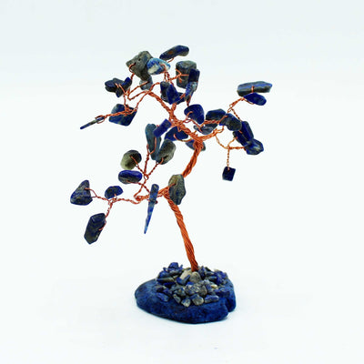 Árbol de piedras preciosas sodalita sobre base de ágata azul