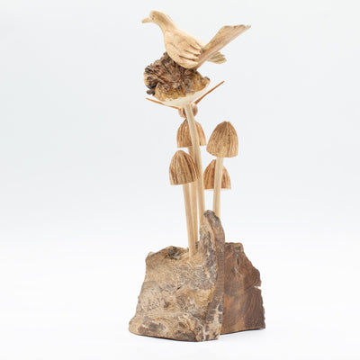 Escultura en madera parasitaria