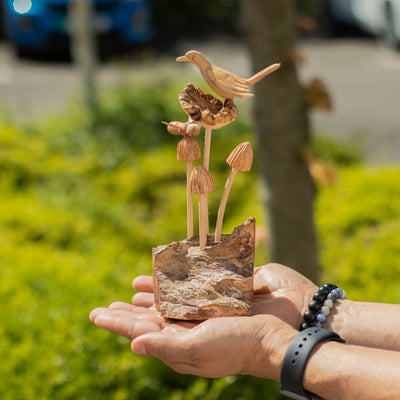 Escultura en madera parasitaria