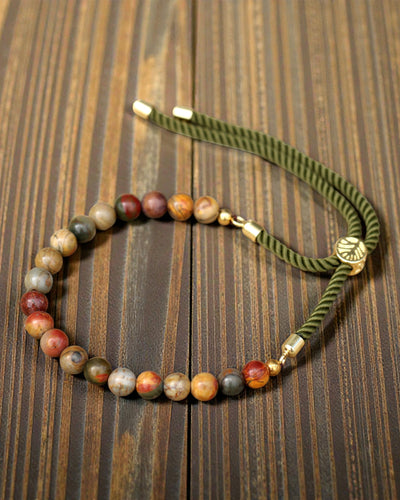 Moss Aura – Pulsera con jaspe Picasso y oro de 18K en cordón verde