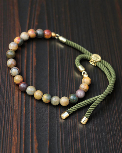 Moss Aura – Pulsera con jaspe Picasso y oro de 18K en cordón verde