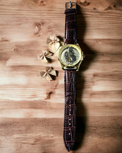 Reloj de Hombre con Mecanismo Transparente - Elegancia y Precisión en Montura Dorada