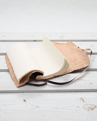 Cuaderno de viaje de cuero enrollable Nomad Negro – 21 × 15 cm